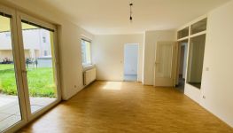             Traumhaftes Wohnen am Wallersee - EG-Wohnung mit Garten, Terrasse und Garage in Top-Lage für nur € 334.000,00!
    